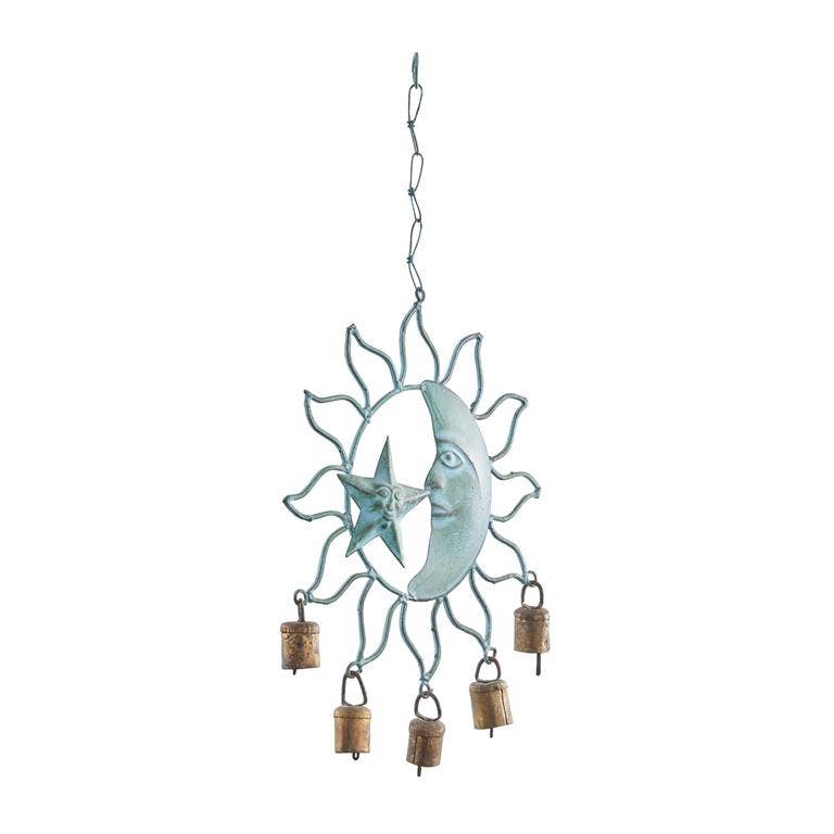 Angled view of the teal patina sun-and-moon wind chime with its hanging chain and five brass bells on a white background.