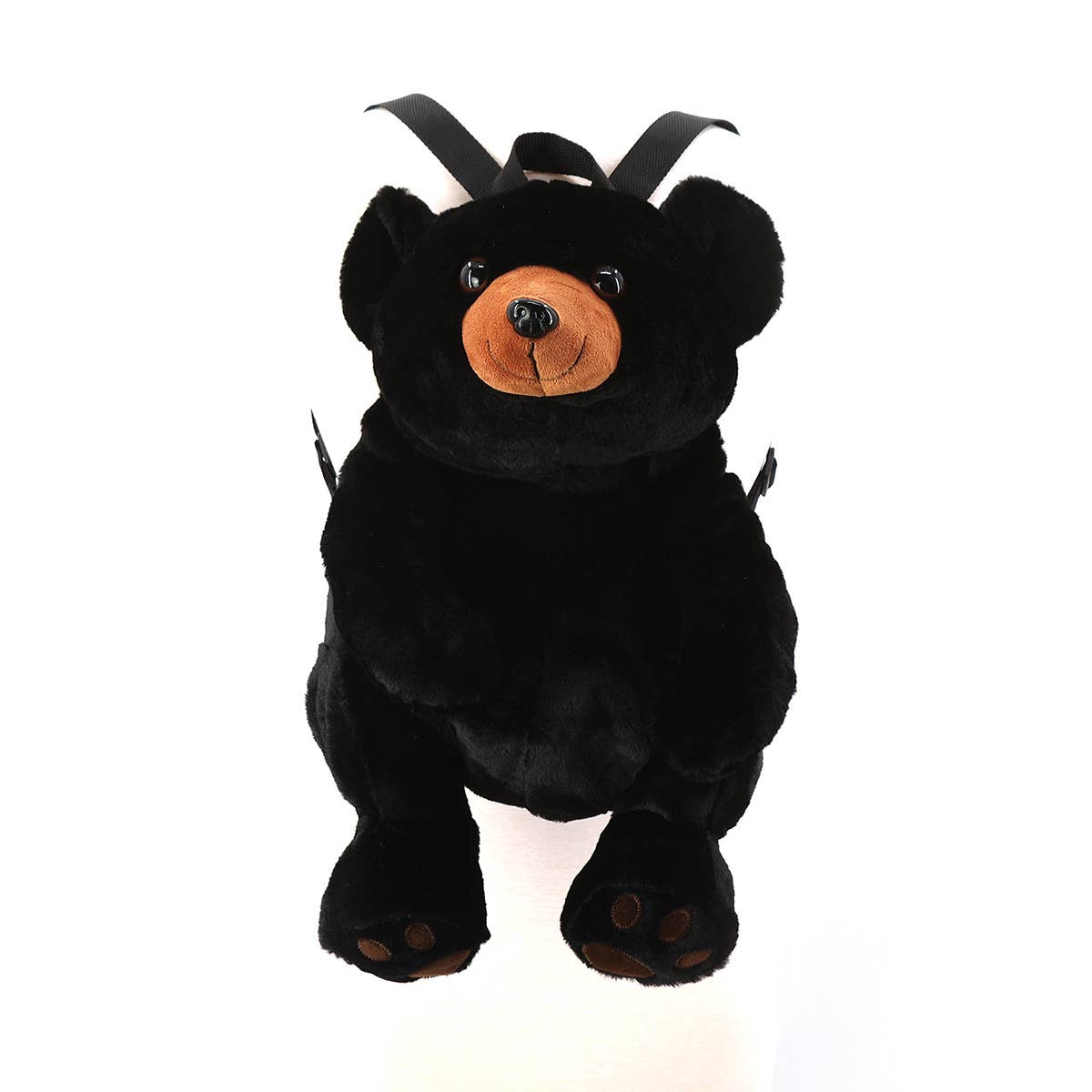 Close-up of black bear plush backpack face showing ultra-soft fur texture, sparkling eyes and embroidered nose detail by GoodStuff Co