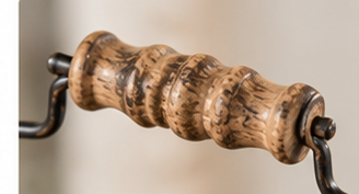 Close-up of the shaped wooden grip on the Curtis Island lantern’s metal carry handle