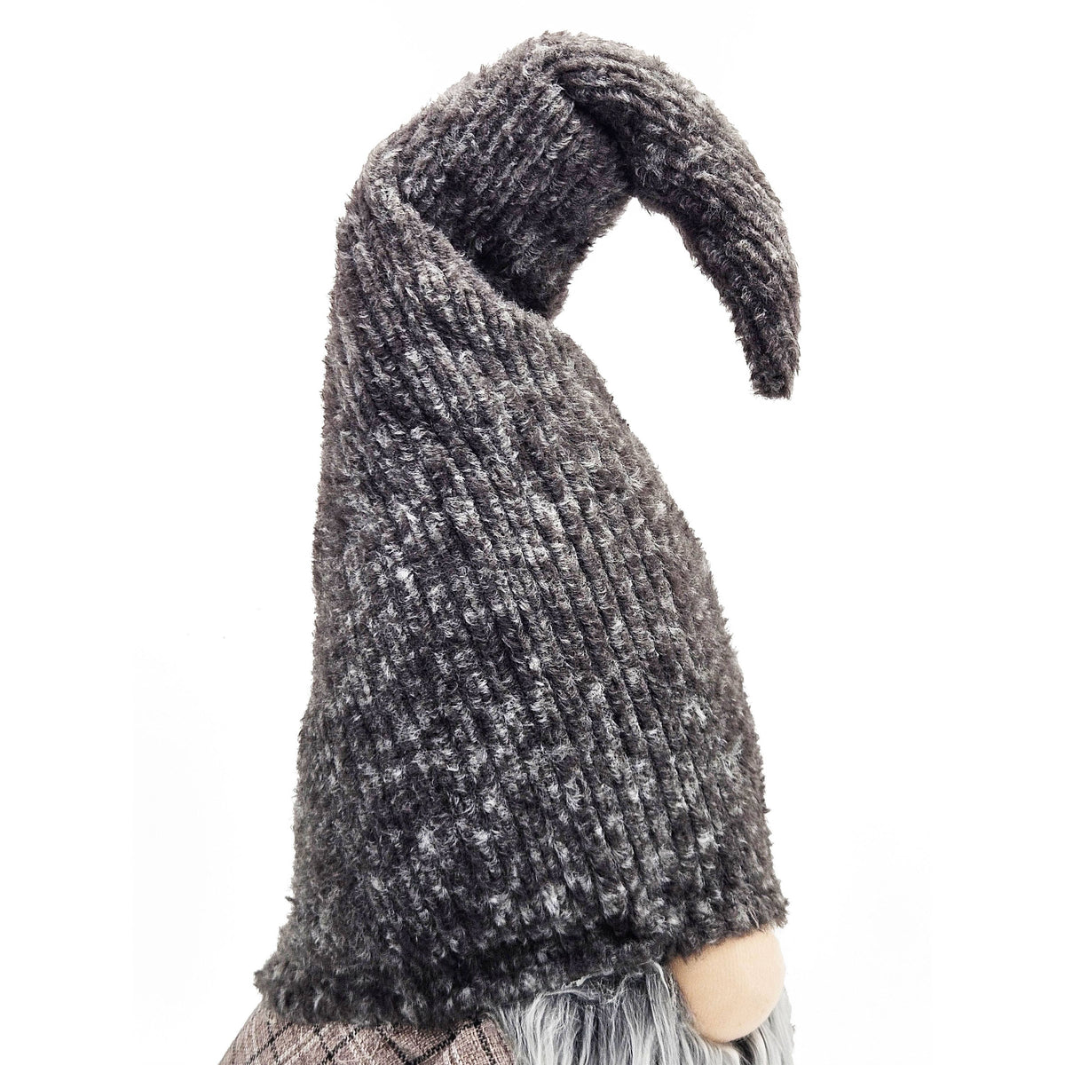 Close-up of the gnome’s charcoal-gray knit hat with a folded, floppy tip.