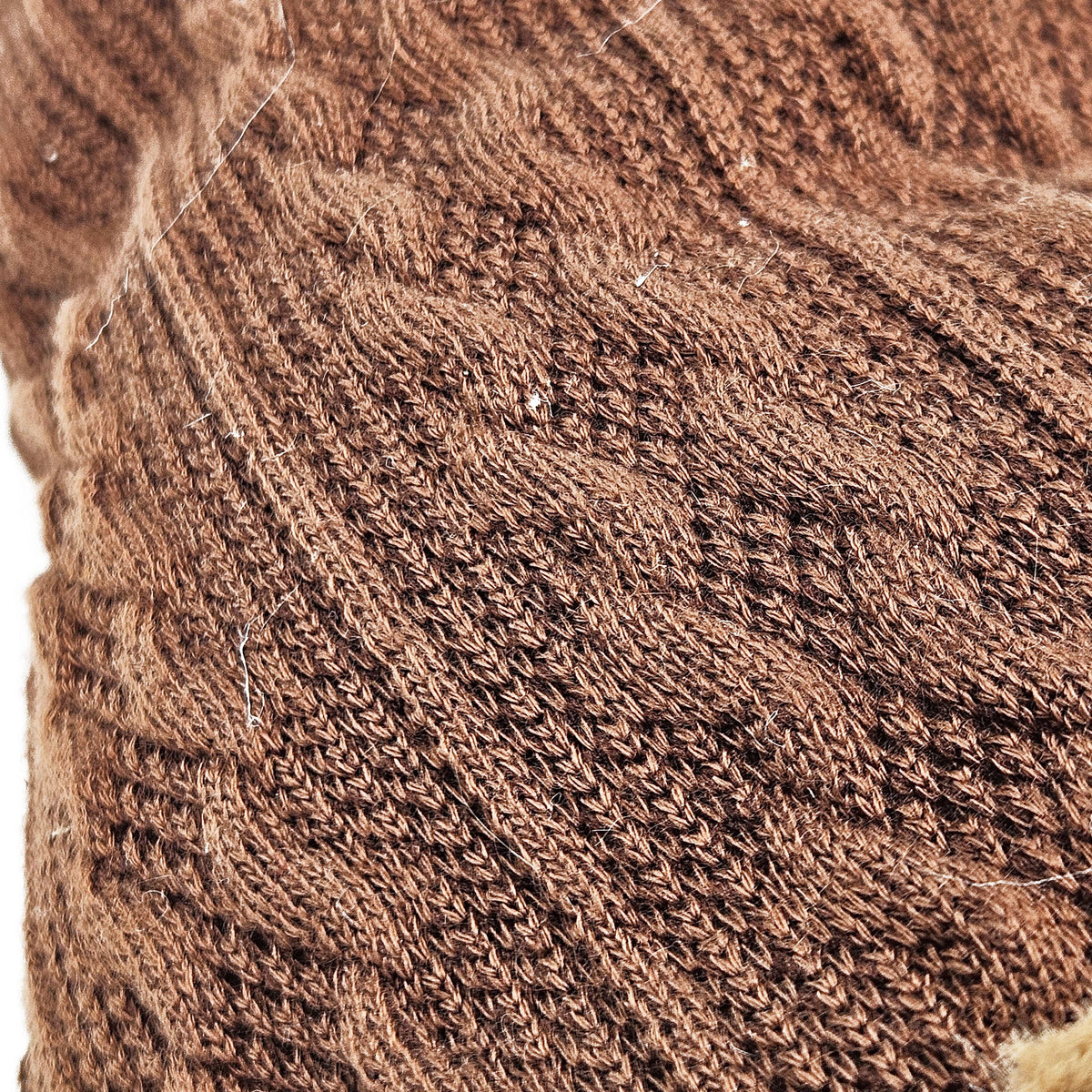 Close-up of the harvest gnome’s brown cable-knit hat texture