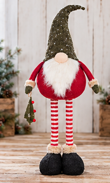 Tree Gift Christmas gnome with extended red-and-white striped legs, a green dotted hat, and black boots