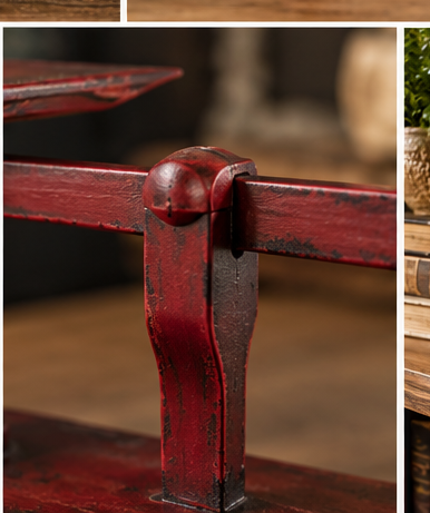 Close-up of the red metal balance beam and central support with a distressed finish