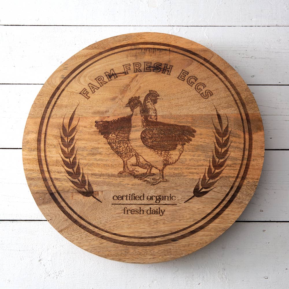 Top-down view of 18-inch Farm Fresh Eggs wooden lazy susan showing full chicken motif artwork, natural wood grain, and rotating turntable base — farmhouse kitchen and dining room decor - up close