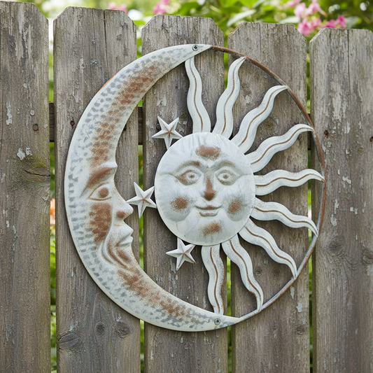Sun and moon art close-up on fence
